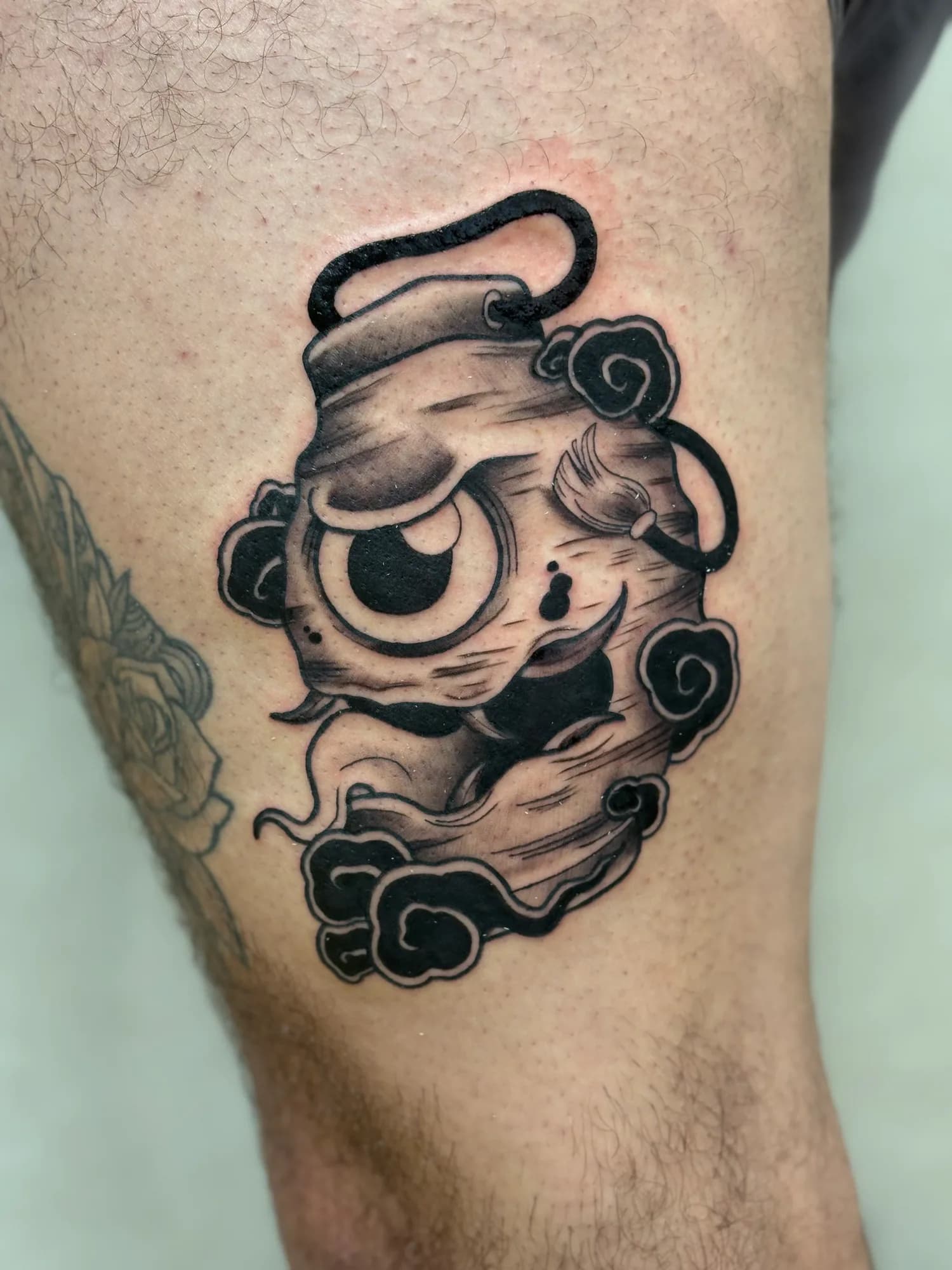 Black and grey Japanese Chochin Obake Yokai thigh tattoo by Kamy Cao.